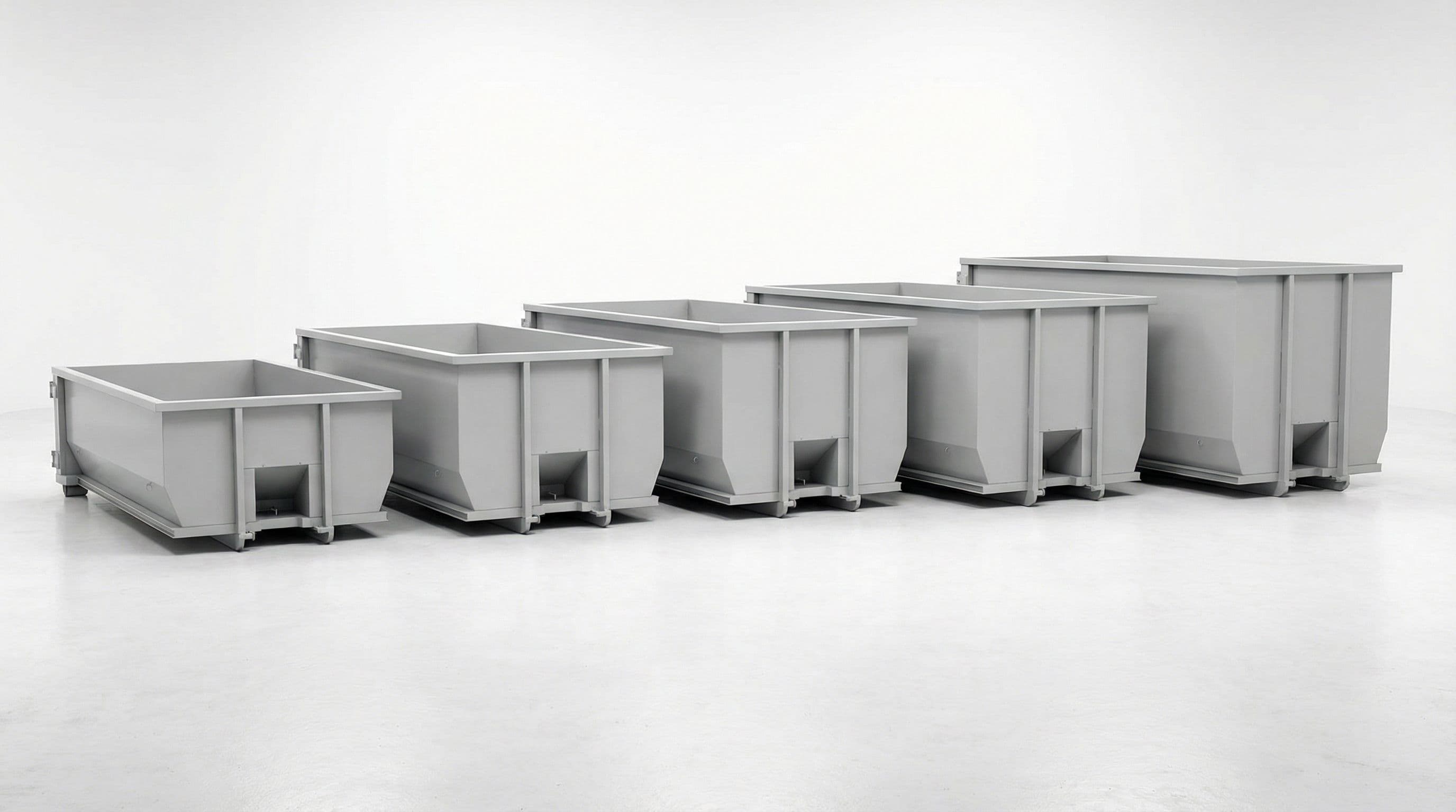 Roll-off dumpsters of increasing sizes lined up for comparison
